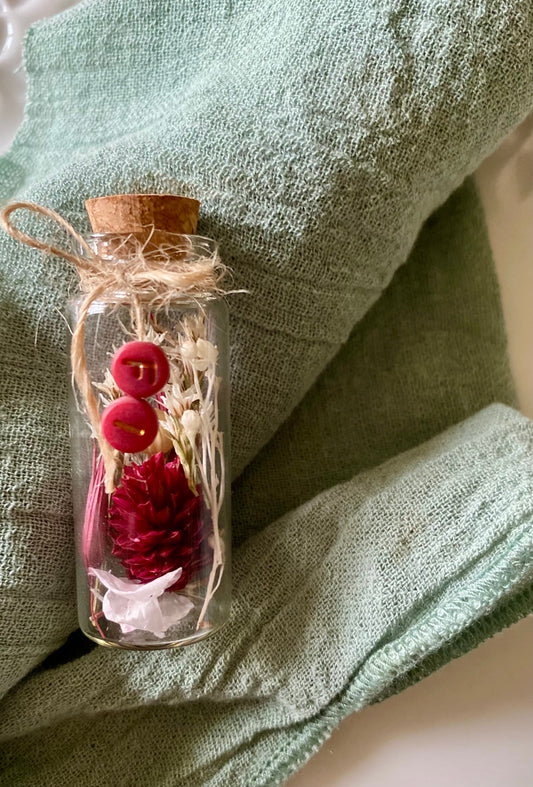 Fioles en verre fleurie