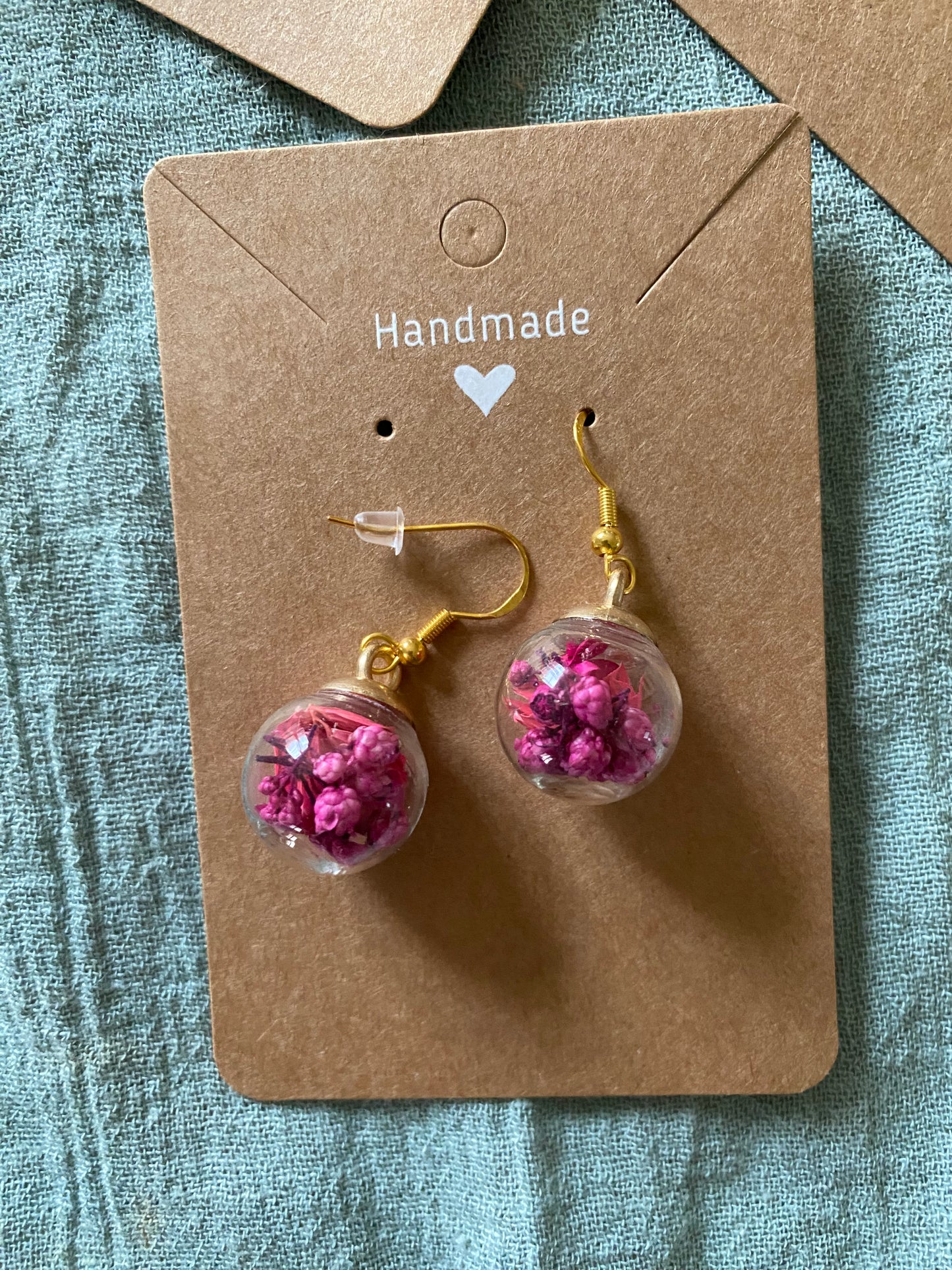 Boucles d’oreilles sphériques fleuries