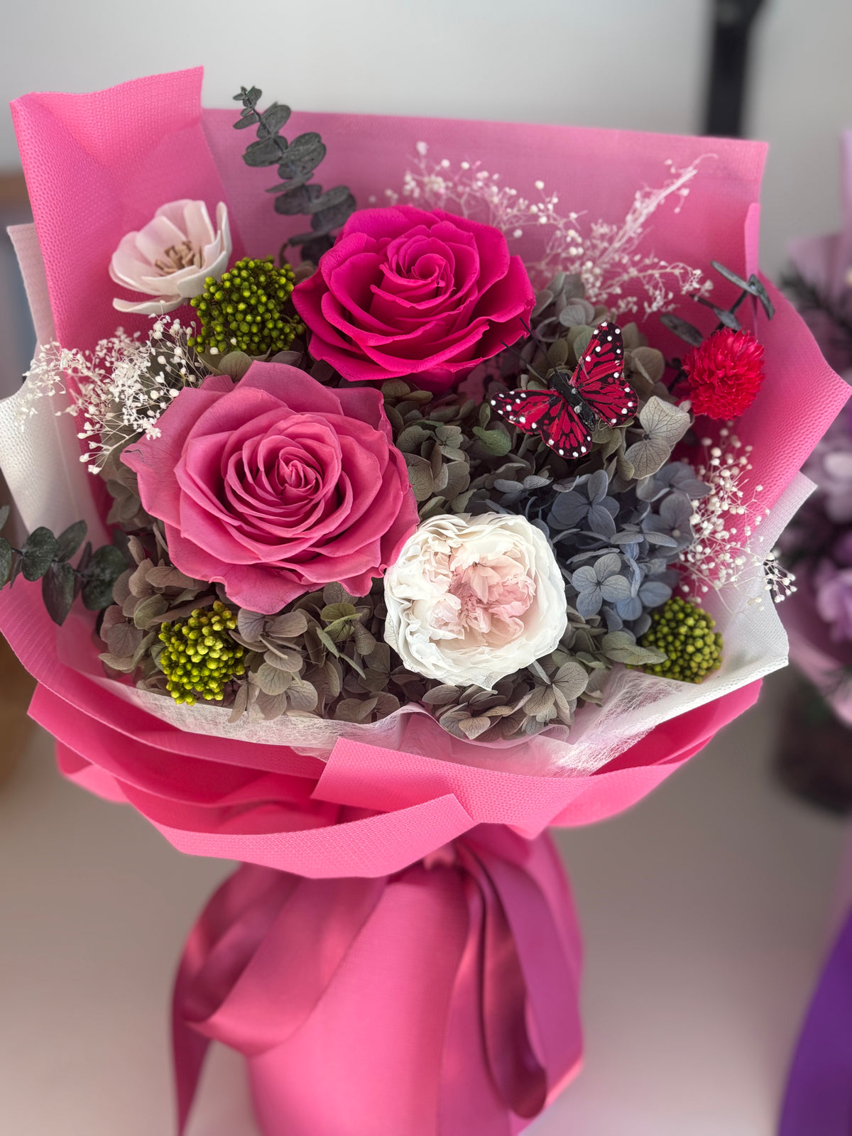 Bouquet de fleurs stabilisées Éclat Fuchsia